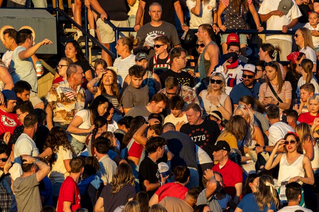 The crowd reacts after an errant firework exploded among attendees during Stadium of Fire held at LaVell Edwards Stadium in Provo, Utah