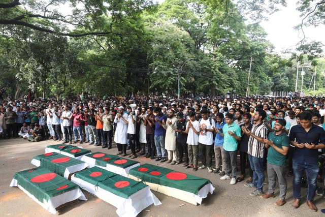 Students advocating for quota reform in public service hold a mock funeral at Dhaka University in memory of those who died during clashes in the city on Wednesday