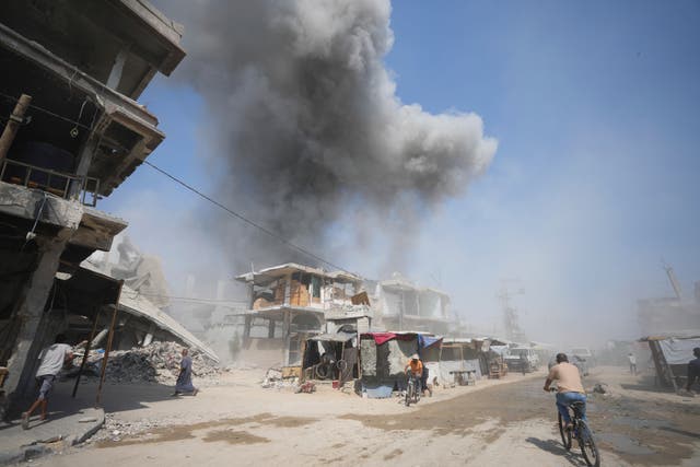 Smoke rises following Israeli bombardments in Khan Younis, Gaza Strip,