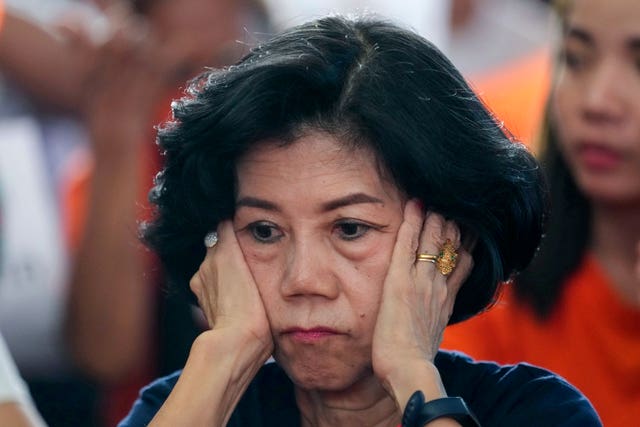 A supporter of the Move Forward Party reacts at the party headquarters