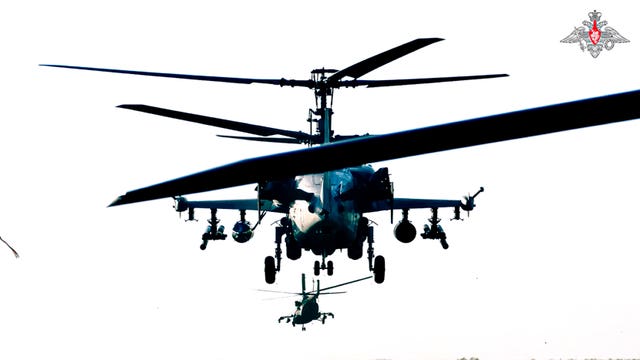 Helicopter gunships from the Russian air force take off
