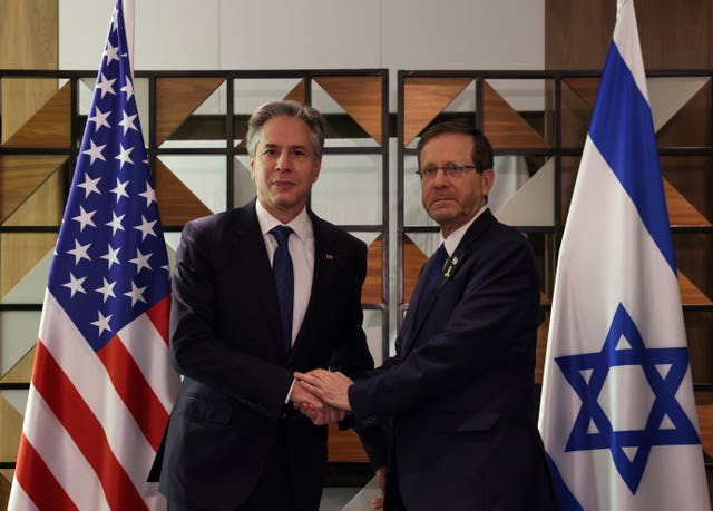 US Secretary of State Antony Blinken, left, meets with Israel’s President Isaac Herzog, in Tel Aviv, Israel