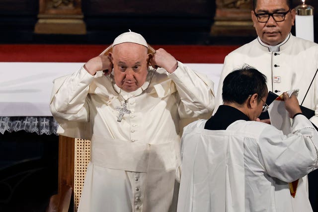 The Pope with headphones