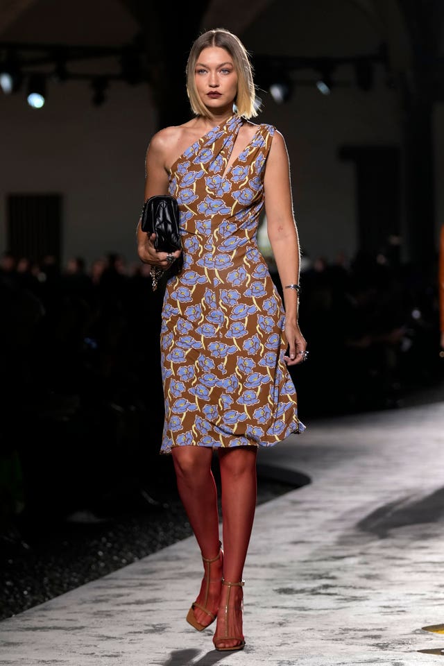 Gigi Hadid wears a creation as part of the Versace Spring Summer 2025 collection