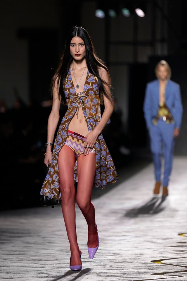 A model wears a creation as part of the Versace Spring Summer 2025 collection