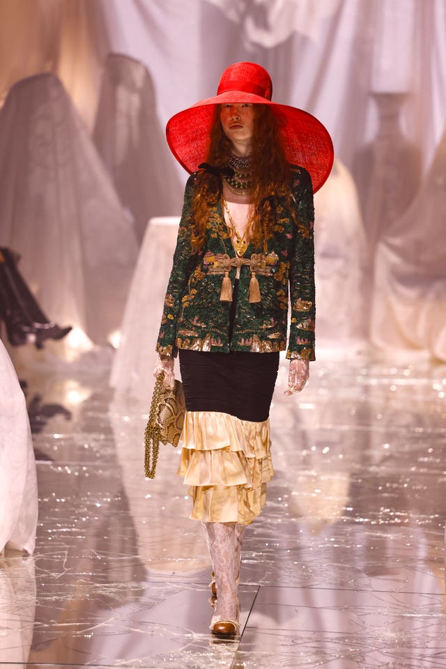 A model wears a creation as part of the Valentino Spring/Summer 2025 collection