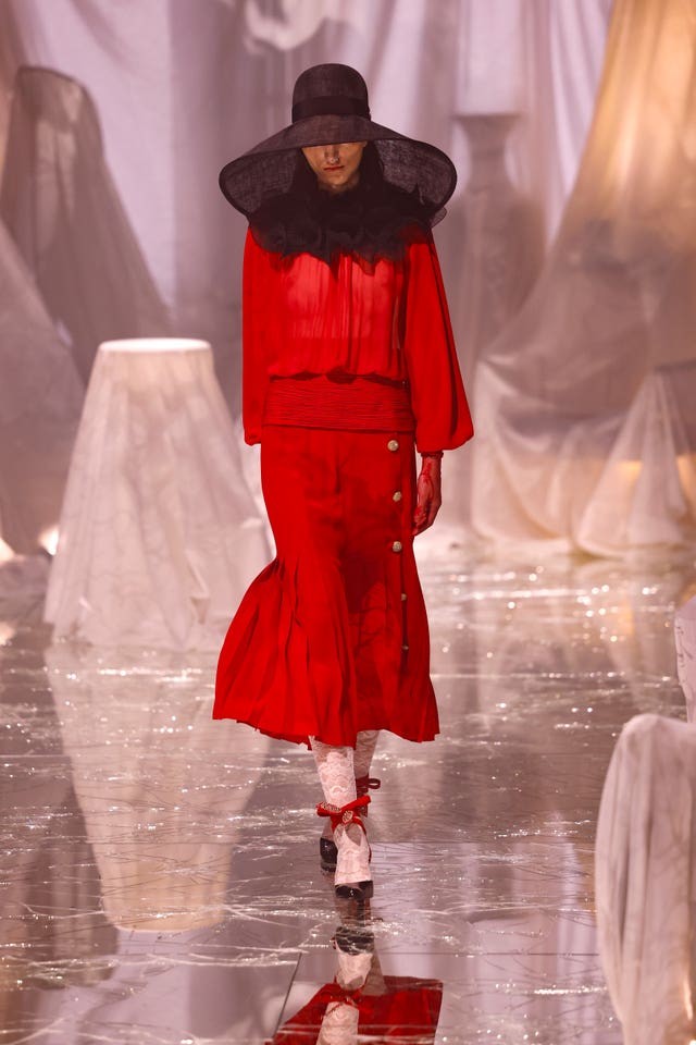 A model wears a creation as part of the Valentino Spring/Summer 2025 collection