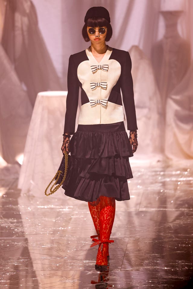 A model wears a creation as part of the Valentino Spring/Summer 2025 collection