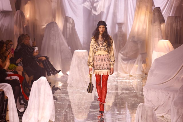 A model wears a creation as part of the Valentino Spring/Summer 2025 collection