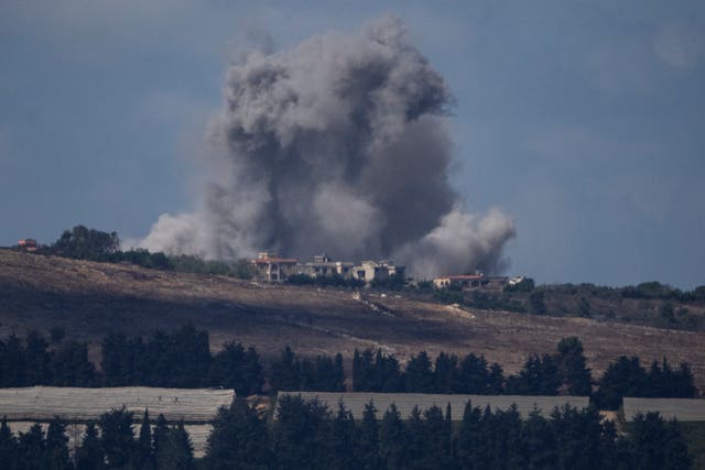 An Israeli air strike hits an area in southern Lebanon as seen from northern Israel