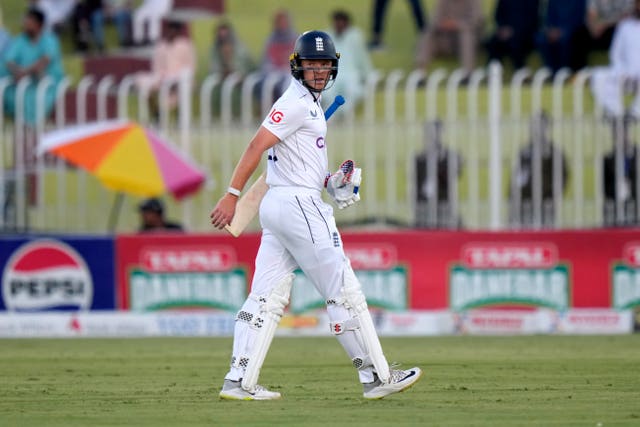 England’s Ollie Pope reacts as he walks off the field