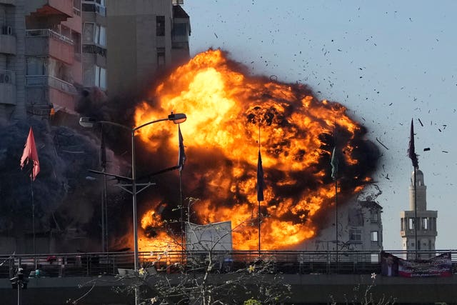 Thick smoke and flames erupt from an Israeli air strike on Tayouneh, Beirut, Lebanon