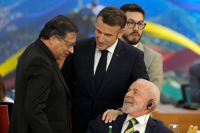 Brazil's President Luiz Inacio Lula da Silva, bottom right, talks with France’s President Emmanuel Macron, centre, and Bolivia’s President Luis Arce during the G20 Summit in Rio de Janeiro