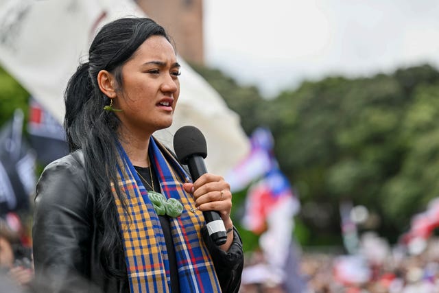 Hana-Rawhiti Maipi-Clarke speaks to the thousands of people gathered outside New Zealand’s parliament