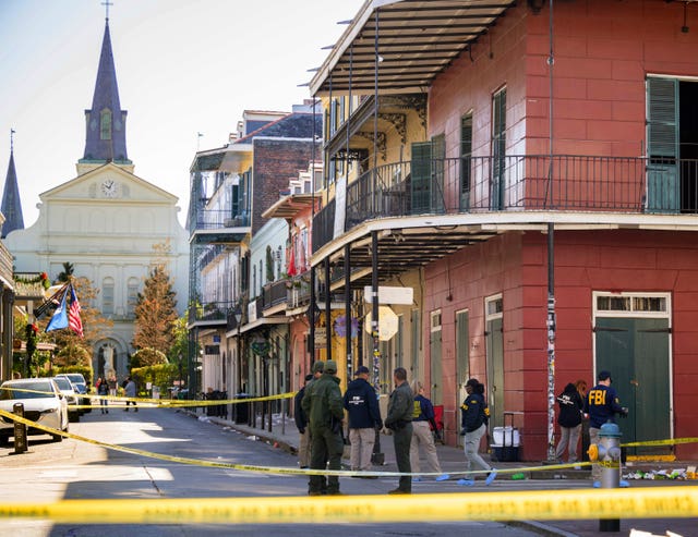 FBI investigators on Orleans St and Bourbon Street in New Orleans