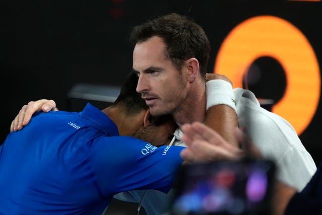 Novak Djokovic, left, hugs coach Andy Murray after beating Carlos Alcaraz