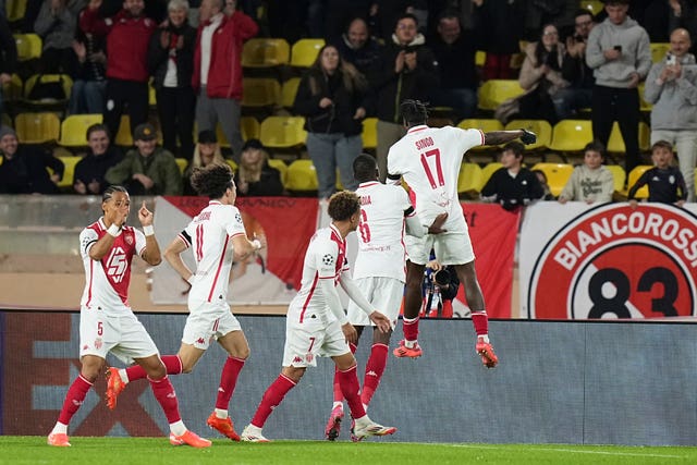 Monaco’s Wilfried Singo, right, celebrates after scoring the only goal