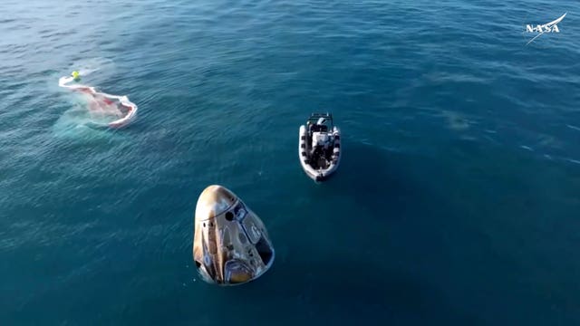 The SpaceX capsule floats in the Gulf of Mexico