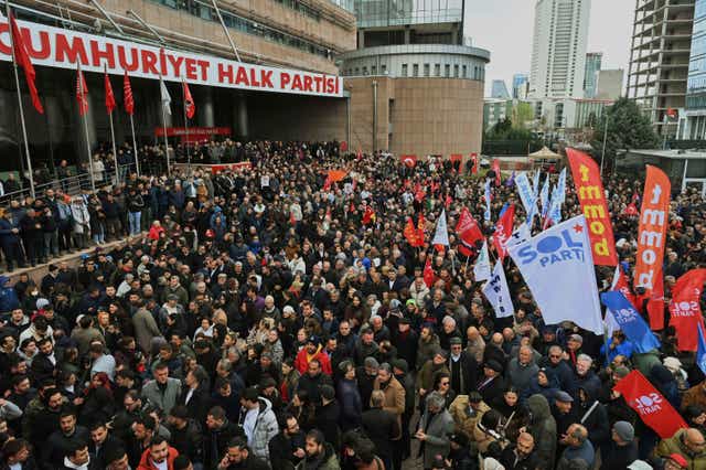 People meet outside the headquarters of the Popular Republican Party of the opposition in Ankara on Wednesday to protest against the arrest of Imamoglu 