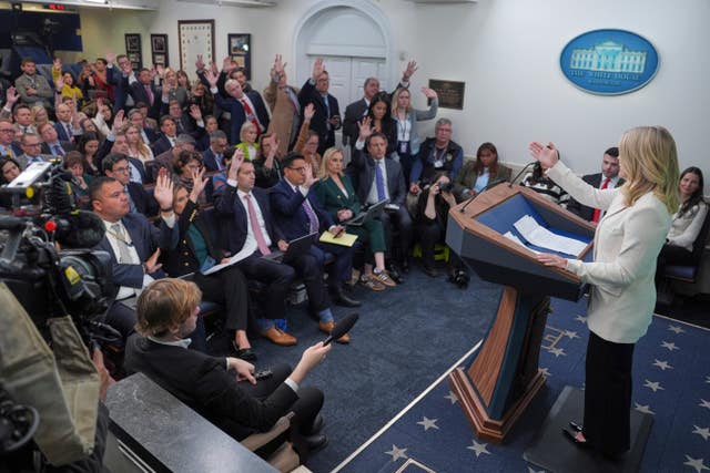 Reporters asking questions in the James Brady Press Briefing Room at the White House