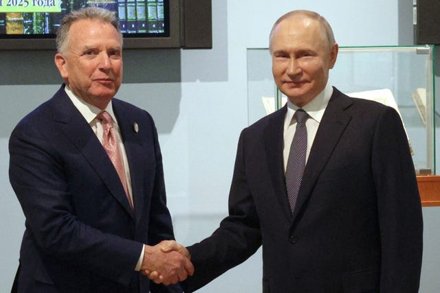 US special envoy Steve Witkoff and Russian President Vladimir Putin shaking hands