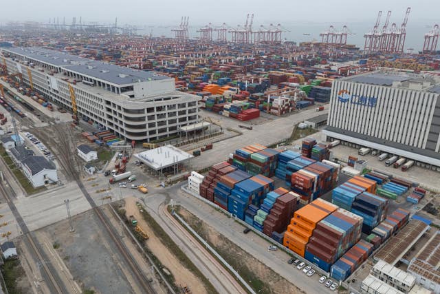 Shipping containers are seen ready for transport at the Guangzhou Port in the Nansha district in southern China’s Guangdong province