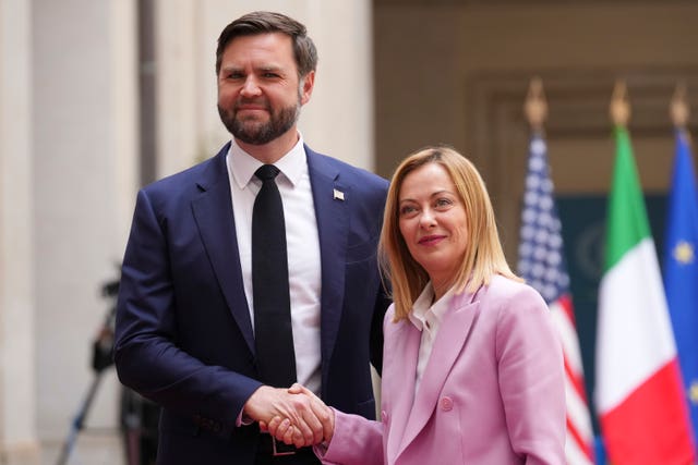 JD Vance is welcomed by Italian premier Giorgia Meloni