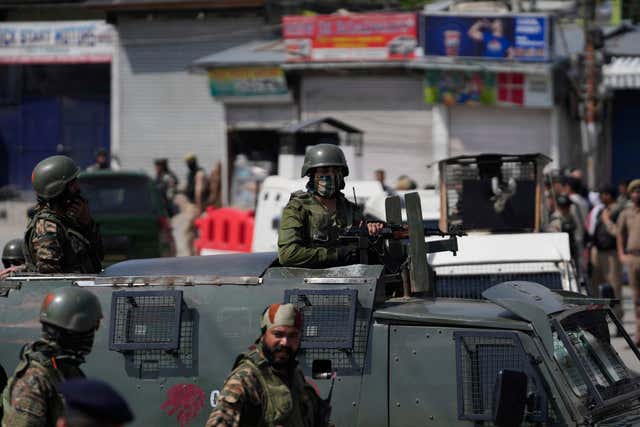 Soldier sitting in an armoured vehicle
