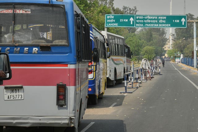Buses carrying Pakistan nationals from India wait to cross over at the Attari-Wagah border between India and Pakistan, following New Delhi’s decision to order almost all Pakistani citizens to leave the country after last week’s deadly attack in Indian-controlled Kashmir