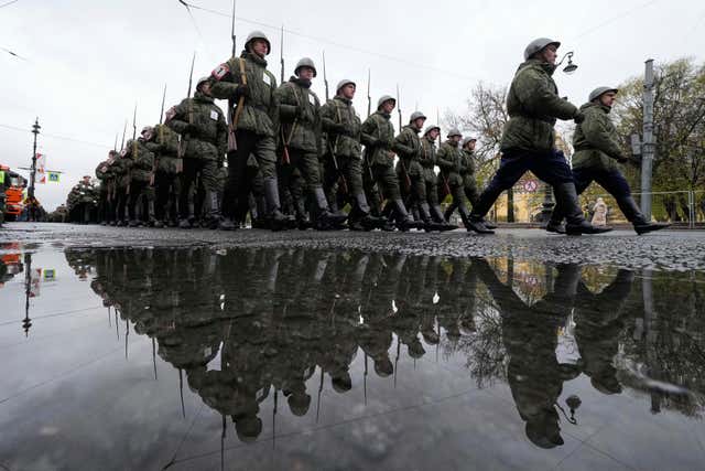 Russian army soldiers march to attend a dress rehearsal for the Victory Day military parade