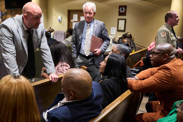 Assistant District Attorney Paul Hagerman, top left, speaks the RowVauhn Wells, Tyre Nichols' mother, in court