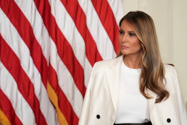 Melania Trump before the stars and stripes