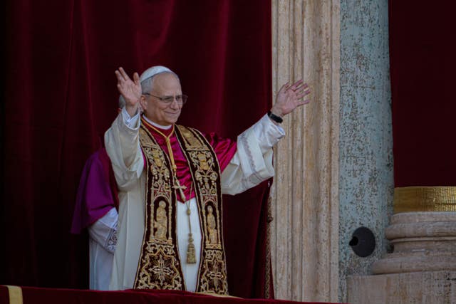The new Pope waves