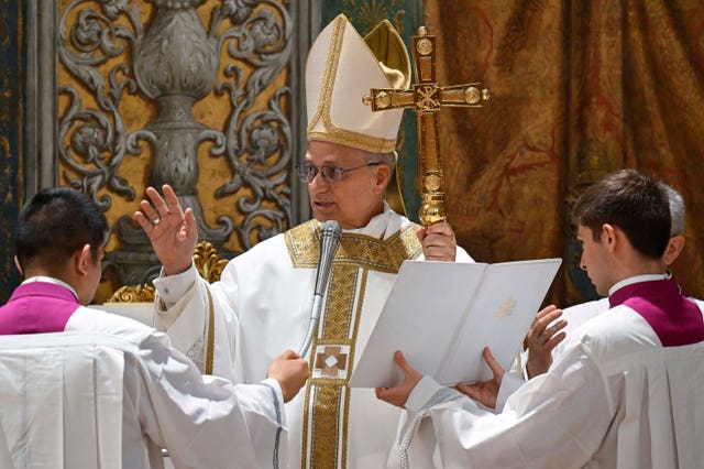 Newly elected Pope Leo XIV concelebrates Mass with the College of Cardinals inside the Sistine Chapel at the Vatican the day after his election as 267th pontiff of the Roman Catholic Church