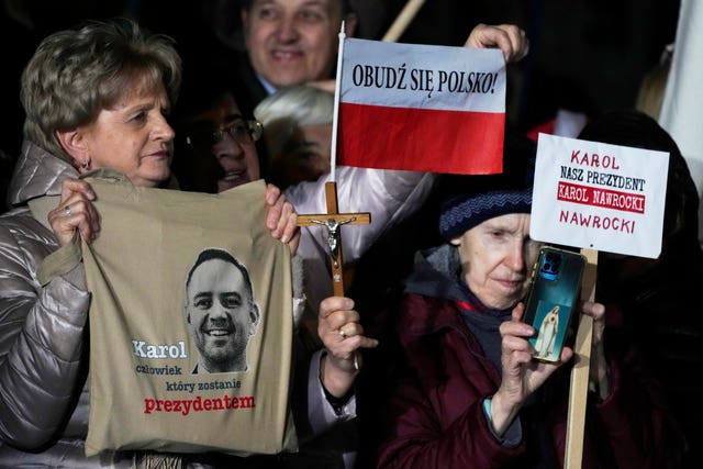 People holding up banners