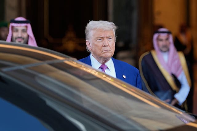 President Donald Trump looks on as he leaves the Royal Palace after a signing ceremony with Saudi Crown Prince Mohammed bin Salman in Riyadh, Saudi Arabia