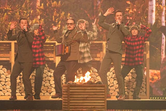 Kaj from Sweden perform the song Bara Bada Bastu during the first semi-final
