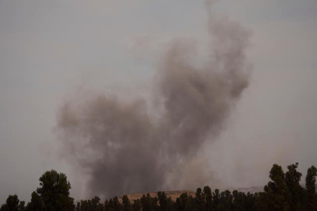 Smoke rises following an Israeli air strike in the Gaza Strip