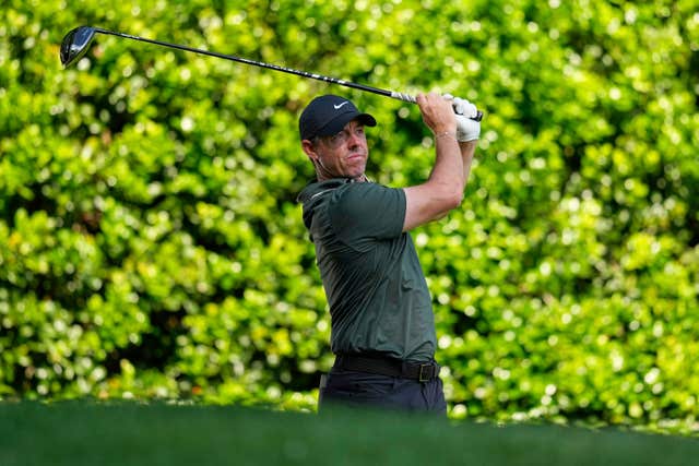 Rory McIlroy watches his tee shot