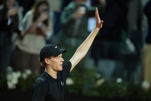 Jannik Sinner waves to the crowd in Rome