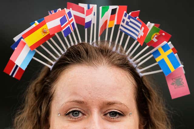 A Eurovision fan is pictured in the cue to the Grand Final of the 69th Eurovision Song Contest in Basel, Switzerland