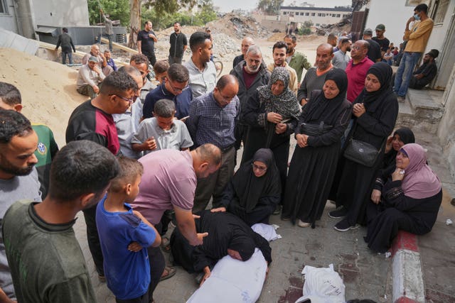 A group of people at a funeral