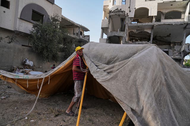 A family shelters in a tent