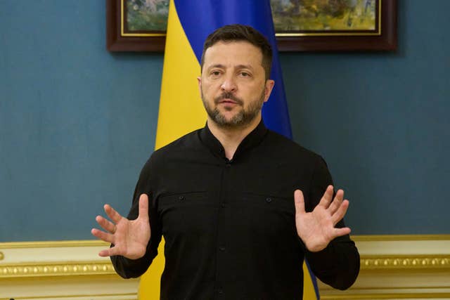 Ukrainian President Volodymyr Zelensky speaks during a briefing in Kyiv