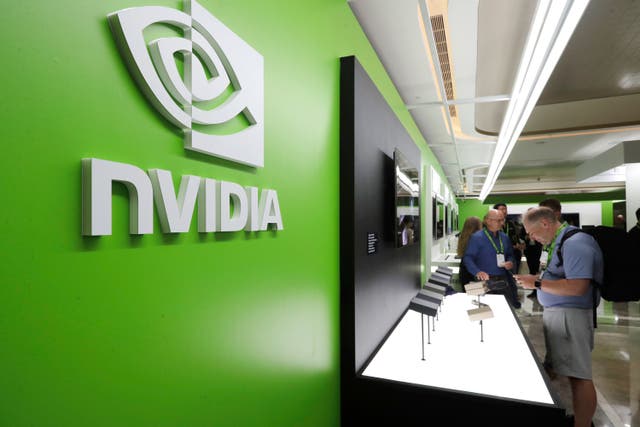 People take a look to Nvidia”s new products during the Computex 2025 exhibition in Taipei, Taiwan
