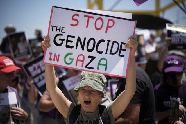 People take part in a protest demanding the end of the war in the Gaza Strip in an area near the Israeli-Gaza border in Sderot, southern Israel