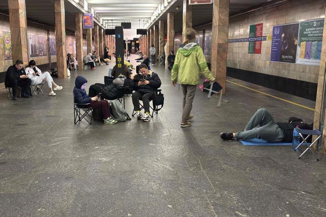 People take shelter at Kontraktova Ploshcha subway station