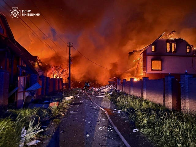 Buildings on fire and masses of smoke