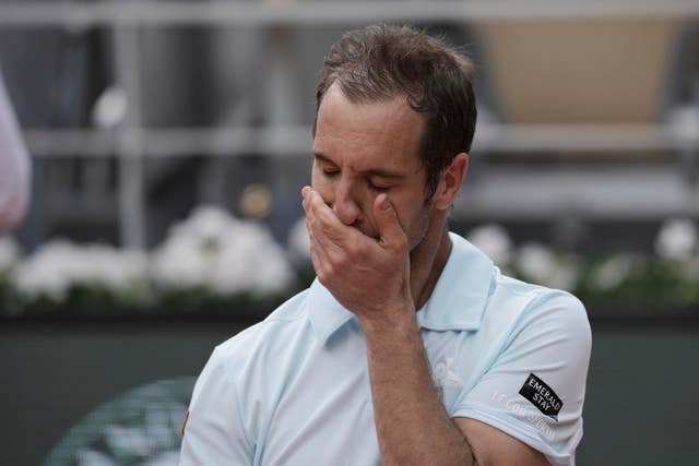 An emotional Richard Gasquet with his hand over his mouth after defeat to Jannik Sinner