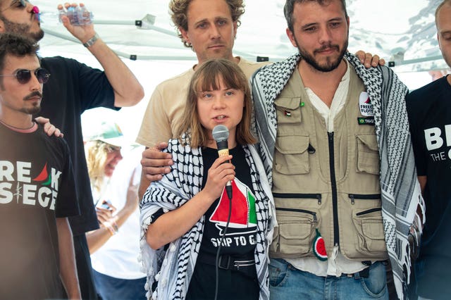 Greta Thunberg with other activists
